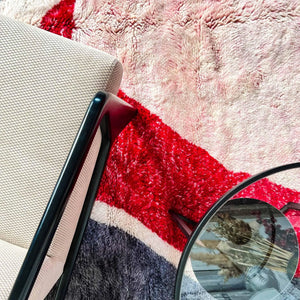 Bring the beauty of the Moroccan mountains into your home with the Rosy Abstract Handwoven 100% Wool Beni Mrirt Rug, a classic Beni Ourain rug measuring 8.1 X 9.9 ft / 247 X 304 cm. Crafted using premium wool, this rug features a unique abstract design and luxurious texture.