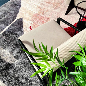 Add a touch of warmth and texture to your decor with the Rosy Abstract Handwoven 100% Wool Beni Mrirt Rug, a beautiful Beni Ourain rug measuring 8.1 X 9.9 ft / 247 X 304 cm. This handcrafted rug features a stunning abstract design and premium wool texture.
